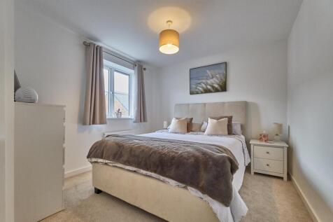 BEDROOM ONE TO FRONT