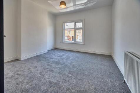 BEDROOM ONE TO FRONT