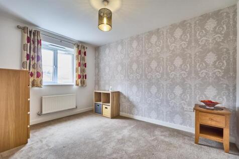BEDROOM ONE TO REAR