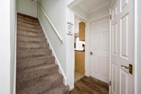 Stairs rising to First Floor