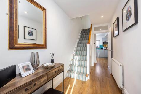 Stairs rising to First Floor