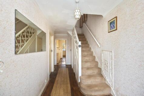 Stairs rising to First Floor