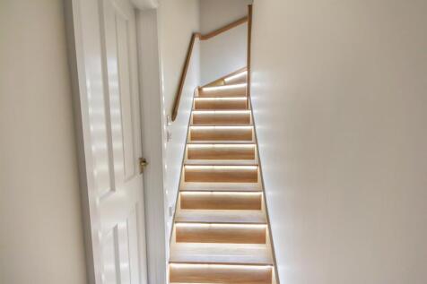 Stairs leading to first floor