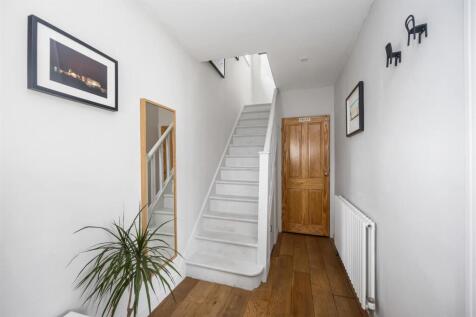 Stairs rising to First Floor