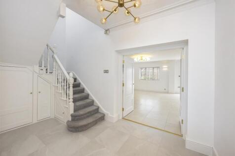 Stairs rising to First Floor