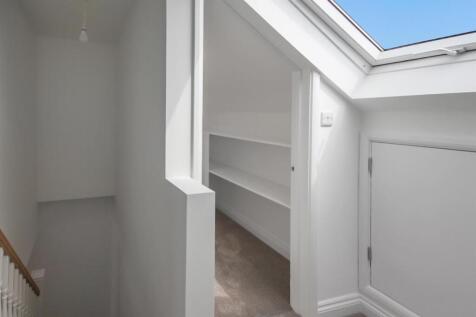 Stairs rising to First Floor