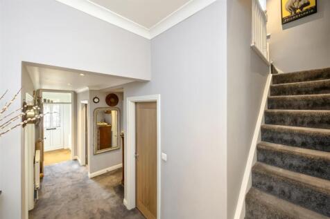 Stairs rising to First Floor