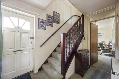 Stairs rising to First Floor