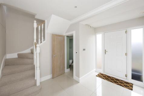 Stairs rising to First Floor