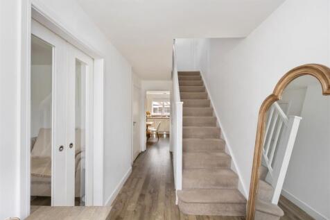 Stairs rising to First Floor