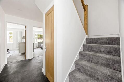 Stairs rising to First Floor