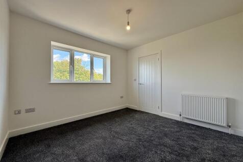 10 Bedroom One.JPEG