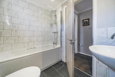 2nd view BATHROOM with SHOWER over bath.jpg