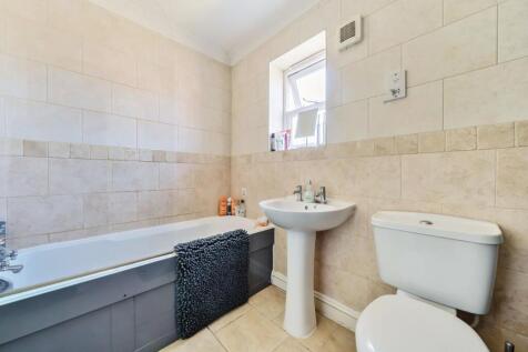 BATHROOM with shower extension over bath.jpg