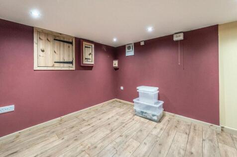 CONVERTED TANKED BASEMENT ROOM