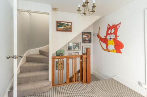 ENTRANCE HALLWAY AND LANDING