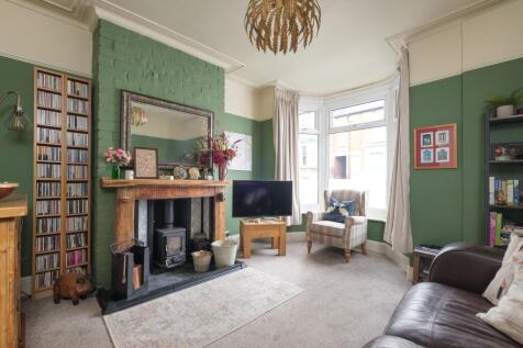 SITTING ROOM AND DINING KITCHEN