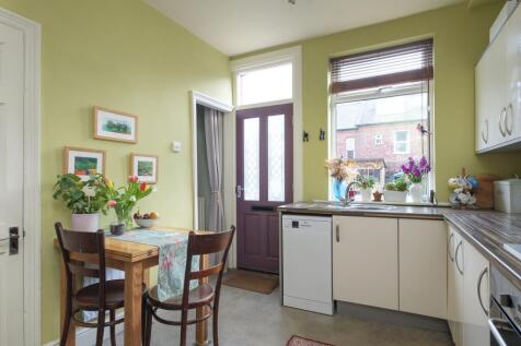 SITTING ROOM AND DINING KITCHEN
