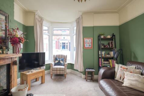 SITTING ROOM AND DINING KITCHEN