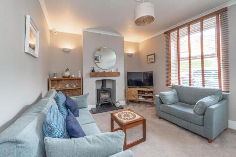 SITTING ROOM AND DINING KITCHEN