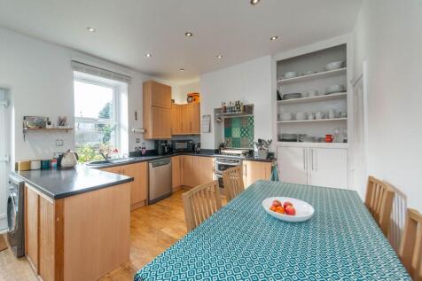 SITTING ROOM AND DINING KITCHEN