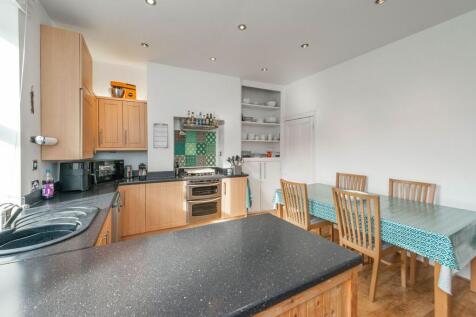 SITTING ROOM AND DINING KITCHEN