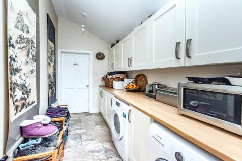 SITTING ROOM DINING KITCHEN AND UTILITY ROOM