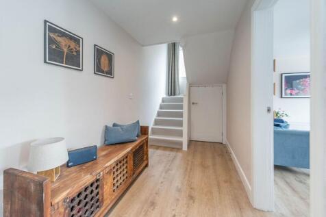 ENTRANCE HALLWAY AND LANDING
