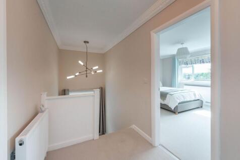 ENTRANCE HALLWAY AND LANDING
