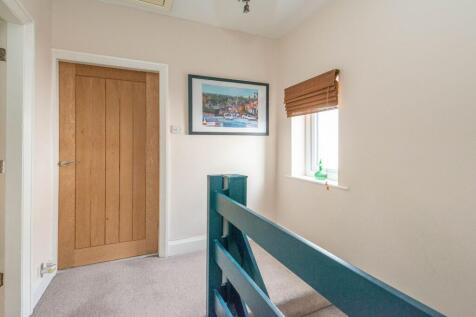 ENTRANCE HALLWAY AND LANDING