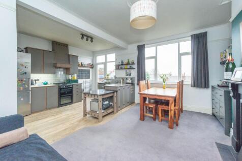 SITTING ROOM AND BEAUTIFUL REAR KITCHEN/DINER
