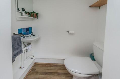 LOWER GROUND FLOOR BEDROOM SHOWER ROOM AND STORE
