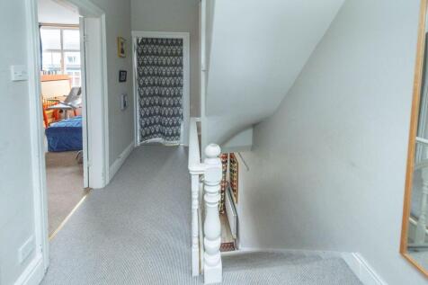 ENTRANCE HALLWAY AND LANDING