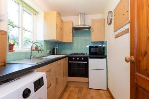 KITCHEN, DINER AND LIVING ROOM