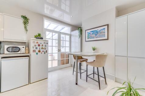 SITTING ROOM DINING KITCHEN AND CONSERVATORY
