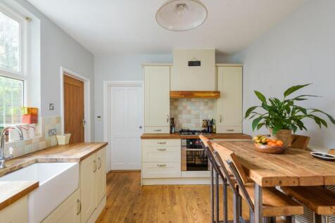 SITTING ROOM AND DINING KITCHEN