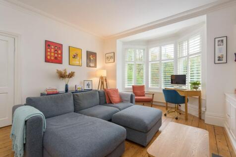 SITTING ROOM AND DINING KITCHEN