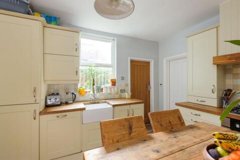 SITTING ROOM AND DINING KITCHEN