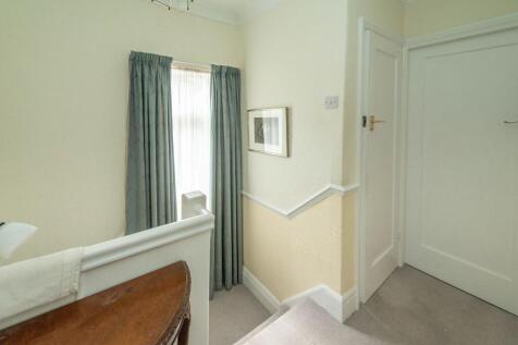 ENTRANCE HALLWAY AND LANDING