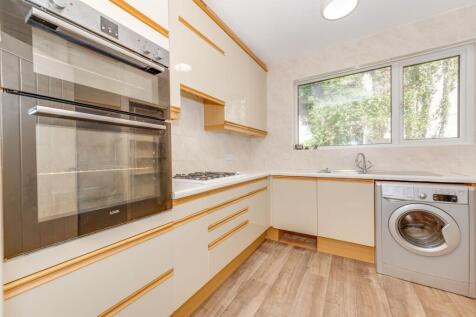 SITTING ROOM AND KITCHEN