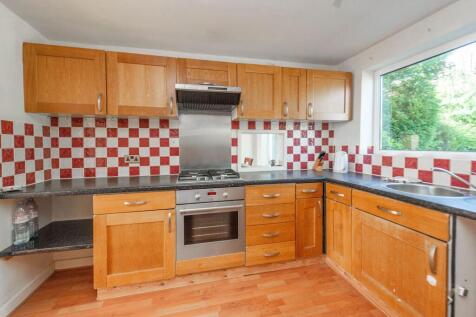 THROUGH SITTING/DINING ROOM &amp; KITCHEN