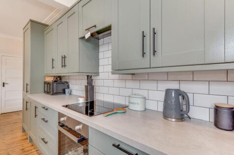 KITCHEN, LIVING ROOM AND DINING ROOM