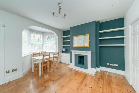 SITTING ROOM KITCHEN AND UTILITY