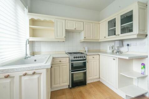 SITTING ROOM KITCHEN AND UTILITY