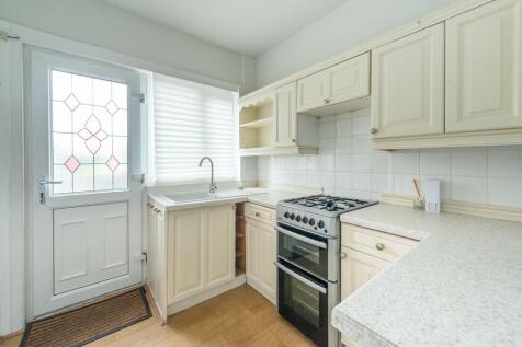 SITTING ROOM KITCHEN AND UTILITY