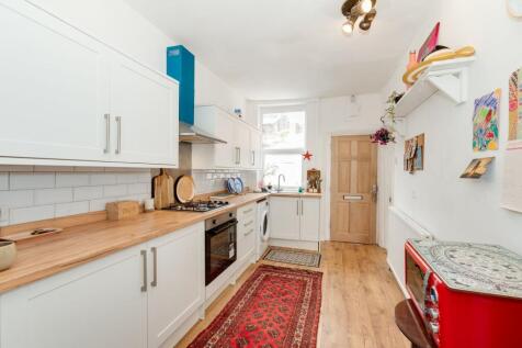 SITTING ROOM AND KITCHEN