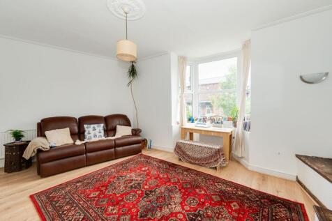 SITTING ROOM AND KITCHEN