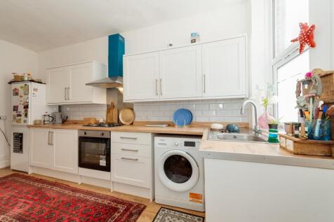 SITTING ROOM AND KITCHEN