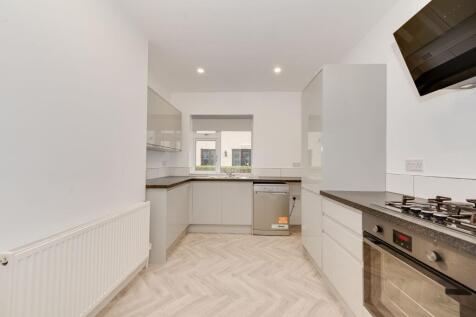 KITCHEN, LIVING ROOM AND CONSERVATORY