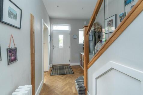 ENTRANCE HALLWAY AND LANDING